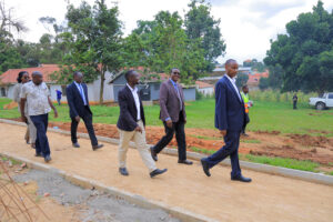 Vice Chancellor Aaron Mushengyezi, Deputy Vice Chancellor for Finance and Administration David Mugawe, and other university administrators inspect ongoing infrastructure works at the Anglican Martyrs Shrine Namugongo