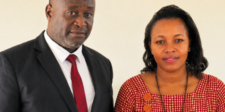 Former Nwoya District CAO Jenephar Nantume Egunyu and newly appointed Chief Administrative Officer Richard Madete. Madete has officially taken over leadership of the district amid ongoing corruption allegations facing Nantume.