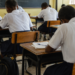 Learners attend a classroom session during the official school holiday break as concerns grow over continued holiday teaching despite ministry directives.