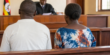 Graphic illustration of a couple appearing before court during a criminal trial.