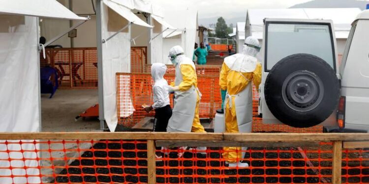 Security and health officials monitoring movement.