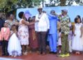 Outgoing leaders and District officials formally hand over Rotary insignia to Rtd. ACGP David Sekabembe Nsalasatta as he is installed as the 6th President of the Rotary Club of Sonde during a colorful Charter Night ceremony in Sonde.