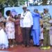 Outgoing leaders and District officials formally hand over Rotary insignia to Rtd. ACGP David Sekabembe Nsalasatta as he is installed as the 6th President of the Rotary Club of Sonde during a colorful Charter Night ceremony in Sonde.
