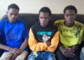 From left to right are Hassan Mugoya, Ashiraf Kyakatuka and Asuman Isanga detained at Iganga Central Police Station over alleged impersonation.
