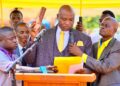 Francis Lukooya Mukoome takes oath during his swearing-in ceremony as Mukono District LC5 Chairperson, marking the official start of his new term in office.