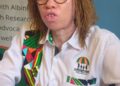 Olive Namutebi, Executive Director of Albinism Umbrella Uganda, addresses journalists during a press briefing in Kampala