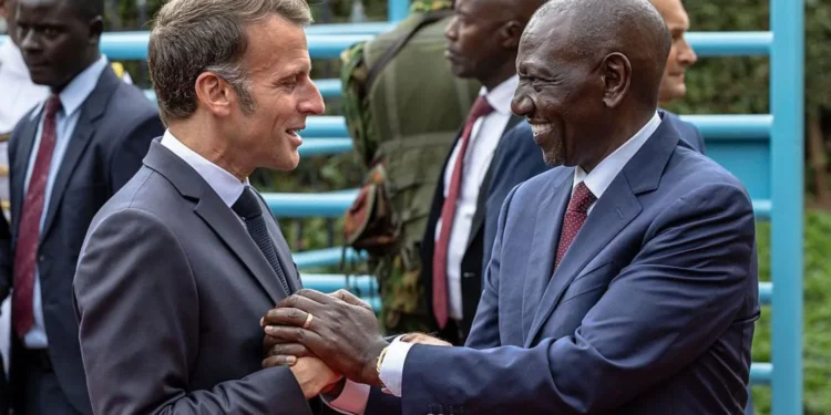 The French President (L) is in Kenya, where he is co-hosting the Africa Forward Summit alongside his Kenyan counterpart (R).