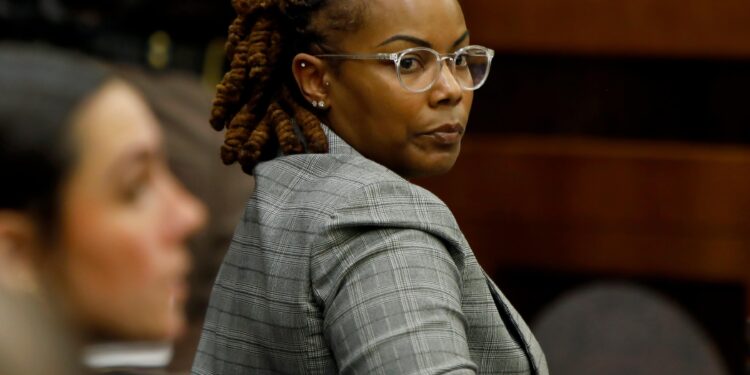 Former Richneck Elementary School assistant principal Ebony Parker looks back into the courtroom during Abigail Zwerner’s lawsuit against her.