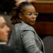Former Richneck Elementary School assistant principal Ebony Parker looks back into the courtroom during Abigail Zwerner’s lawsuit against her.