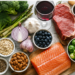 A selection of foods including salmon, garlic, broccoli, asparagus, berries and red meat, pictured in relation to research on how diet can influence natural body odour and perceived attractiveness.
