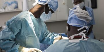 Medical specialists conduct a complex life-saving operation