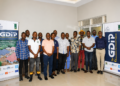 Agricultural extension workers and veterinary officers pose for a group photo during the launch of a dairy development programme in Masaka that will support 7,000 livestock farmers with modern farming practices.