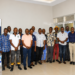 Agricultural extension workers and veterinary officers pose for a group photo during the launch of a dairy development programme in Masaka that will support 7,000 livestock farmers with modern farming practices.
