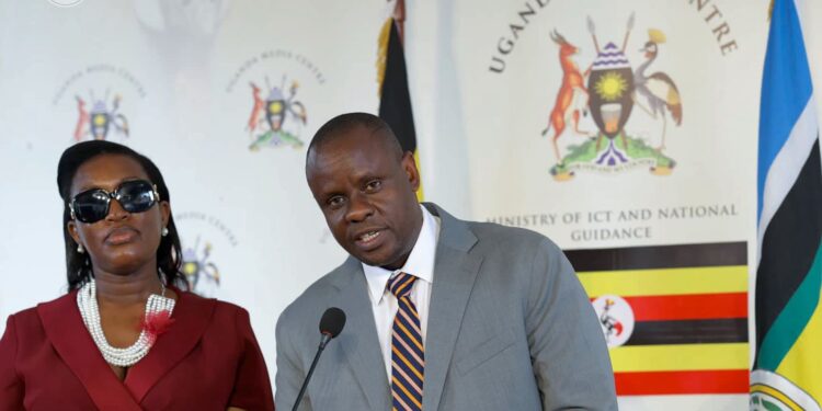 Minister of Local Government Balaam Barugahara Ateenyi and Nameere during a press briefing on the extension of LC1 and LC2 leaders' tenure.
