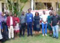 Health workers and journalists at a cafe on Friday