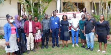Health workers and journalists at a cafe on Friday