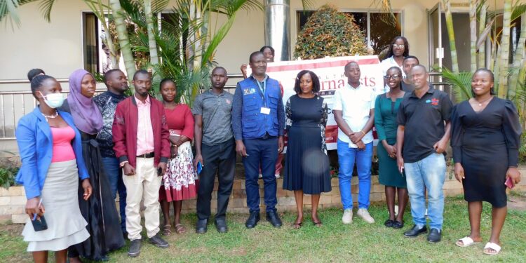 Health workers and journalists at a cafe on Friday