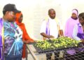 Members of the Lions Club of Masaka and Lions Club of Masaka Greater inspect community projects at Kyabumba Primary School in Masaka District ahead of their joint leadership handover ceremony.