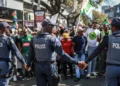 Heavy security personnel monitor coordinated anti-migrant protests taking place across South Africa, as demonstrators march in cities nationwide.