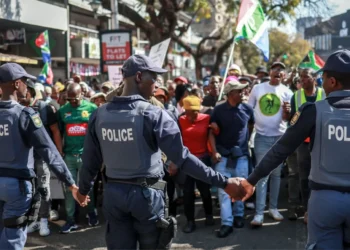 Heavy security personnel monitor coordinated anti-migrant protests taking place across South Africa, as demonstrators march in cities nationwide.
