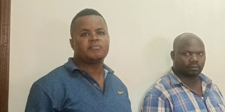 Boniface Kayongo and Hamza Kiseeka apperaing before Mukono grade one magistrate Omwong Gerlad