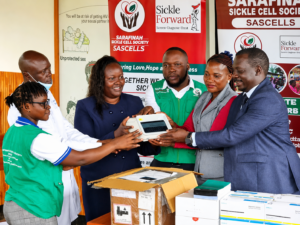 Officials from Goma Health Centre III and Mukono Municipality receive a Gazelle sickle cell diagnostic machine from Sarafinah Sickle Cell Society