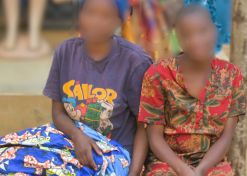 Girls receiving PAC in Masaka_ Photo by Davis Buyondo.