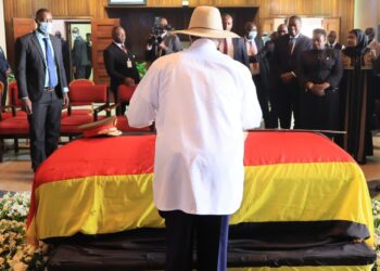 President Yoweri Kaguta Museveni pays his final respects to the late Gen. Moses Ali during a special parliamentary tribute.