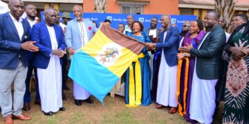 Rt. Hon. Joseph Muvawala the Prime Minister of Busoga Kingdom together with the Stanbic Uganda Holdings staff flagoff the intiative during the launch event at Kyabazinga's palace in Bugembe, Jinja