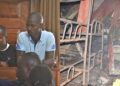 L-R-The accused- Alex Mugarura, Edson Niyo and Dickson Kisuule in the dock during the trial. Photos by Davis Buyondo