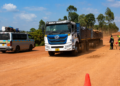 Vehicles navigate the dusty under-construction Masaka-Kyotera-Mutukula road, where delayed works have disrupted trade, increased transport costs and raised safety concerns.