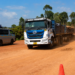 Vehicles navigate the dusty under-construction Masaka-Kyotera-Mutukula road, where delayed works have disrupted trade, increased transport costs and raised safety concerns.
