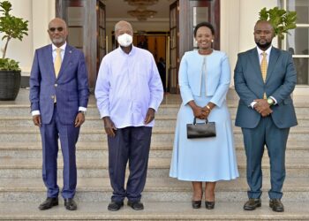 Ministers poses for a photo with President Yoweri Museveni after taking the oath of office at State House, Entebbe.