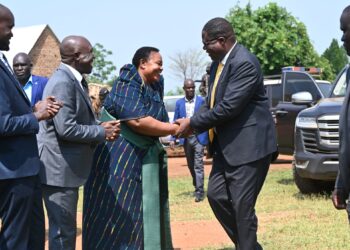 Minister for the Presidency, Hon. Babirye Milly Babalanda, welcomes the Speaker of Parliament, Rt. Hon. Jacob Oboth Oboth, during the thanksgiving service for Bugweri County MP Hon. Hajji Wandera Sadara.