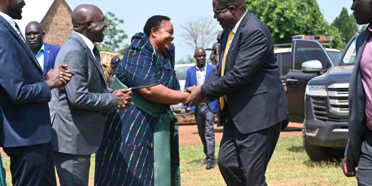 Minister for the Presidency, Hon. Babirye Milly Babalanda, welcomes the Speaker of Parliament, Rt. Hon. Jacob Oboth Oboth, during the thanksgiving service for Bugweri County MP Hon. Hajji Wandera Sadara.