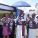 Eurofoam Marketing Manager Claire Kemigisha buys the first jersey from Mukono Diocese Bishop Enos Kagodo to launch the Mukono Cathedral Run