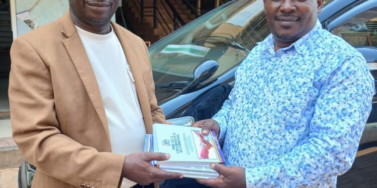RDC Ssegawa Hands Over LC Handbooks to Councillor Kaddu for Mukono Village Leaders