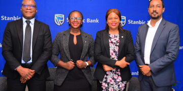 (L-R) Stanbic Bank's Ali Lwanga Head Sales, Syliva Atuhairwe Head Distribution, Yvonne Namutosi Manager Digital and E-Commerce and Dogo Singh Manager Insurance.JPG