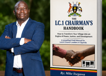 Author Mike Ssegawa poses with copies of his newly published The LC1 Chairman's Handbook, a practical guide designed to equip village chairpersons with leadership, governance and community development skills across Uganda.