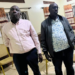 Sembabule District Land Board Secretary Michael Kakuru (in jacket) and Emmanuel Kananura, the Senior Land Management Officer, after their arrest on Thursday over allegations linked to corruption and abuse of office.