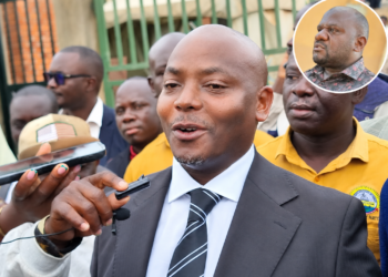 Kibuule addressing media after the court session. In circle is Kiwanuka.