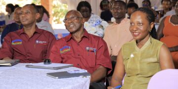 Prof. Aaron Mushengyezi, Prof. James Kiwanuka Tondo and Dr. Lillian Ssekabembe watch the film during the Olutindo research dissemination conference at Nkoyoyo Hall, Uganda Christian University (UCU).