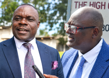 MP Tebandeke and Kiiza, the petitioner.