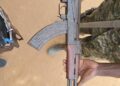 Mother Surrenders Illegal Gun Allegedly Hidden by Wanted Son