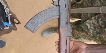 Mother Surrenders Illegal Gun Allegedly Hidden by Wanted Son